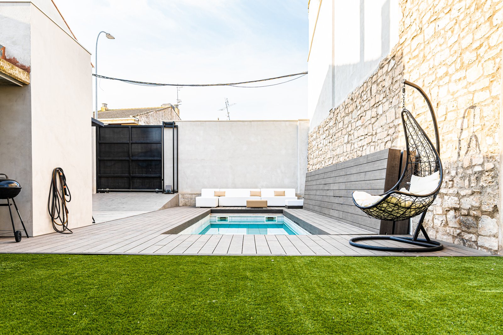 Piscina particular con cubierta plegable